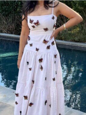 The sacred Agua Beneta Lima butterfly wrap dress